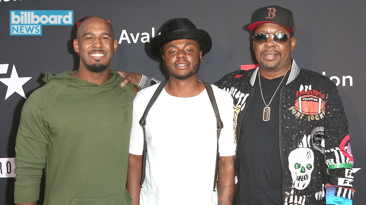 Bobby Brown poses with his sons, Landon (left) and Bobby Brown Jr. (center).