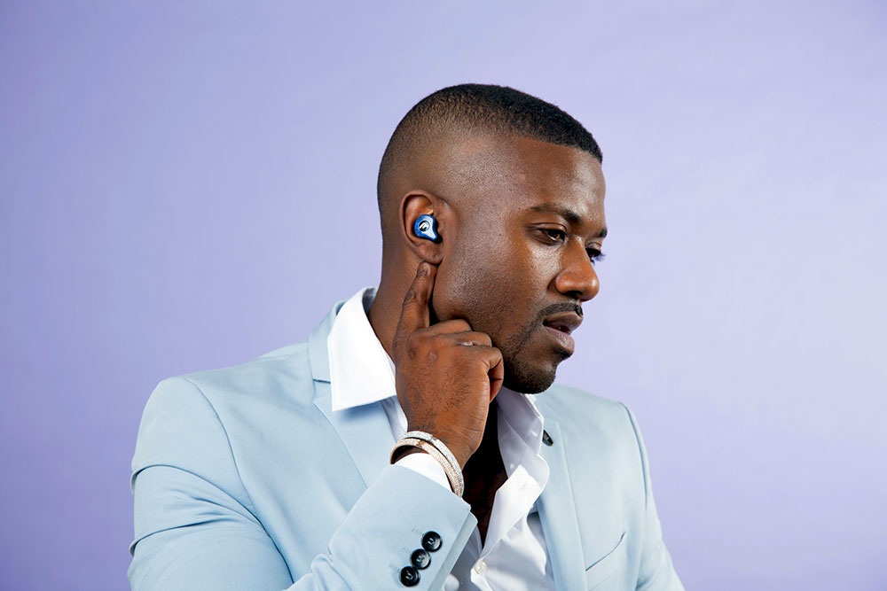 Ray J models in-ear buds from Raycon